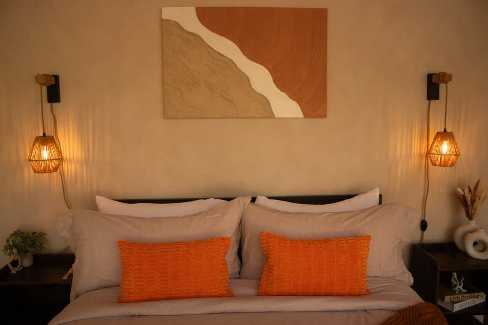Room corner with orange pillows
