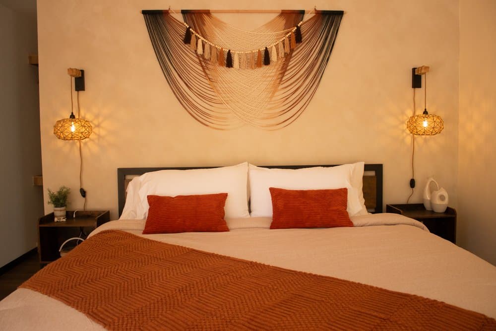 Hotel bedroom with warm lighting