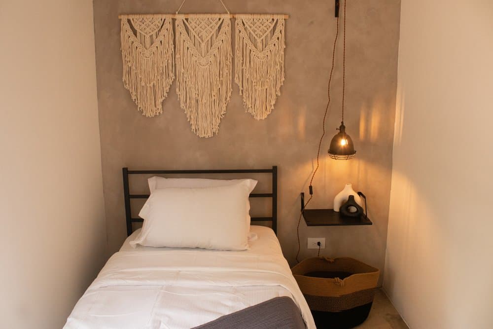 Hotel bed with white linens